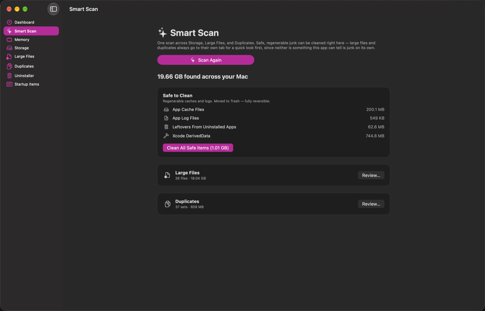 Smart Scan results showing storage found across the Mac, safe items to clean, and large files and duplicates ready to review